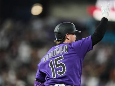 Goodman homers twice, drives in 5 runs in Rockies' 12-6 victory over Royals
