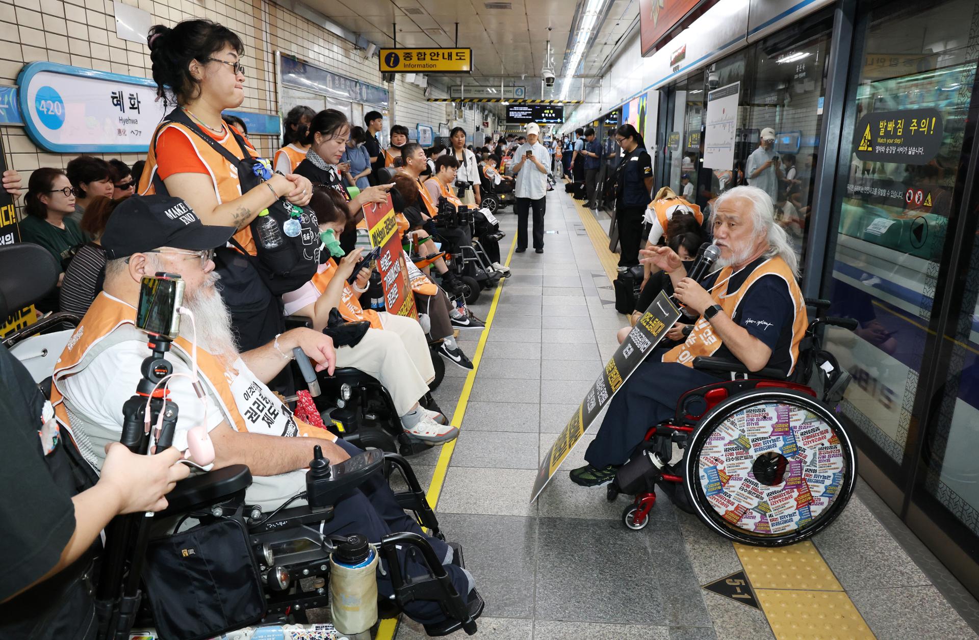 Subway service briefly disrupted amid disability rights protest