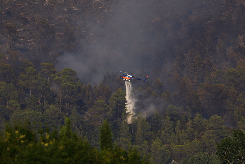 French PM says wildfires are under control