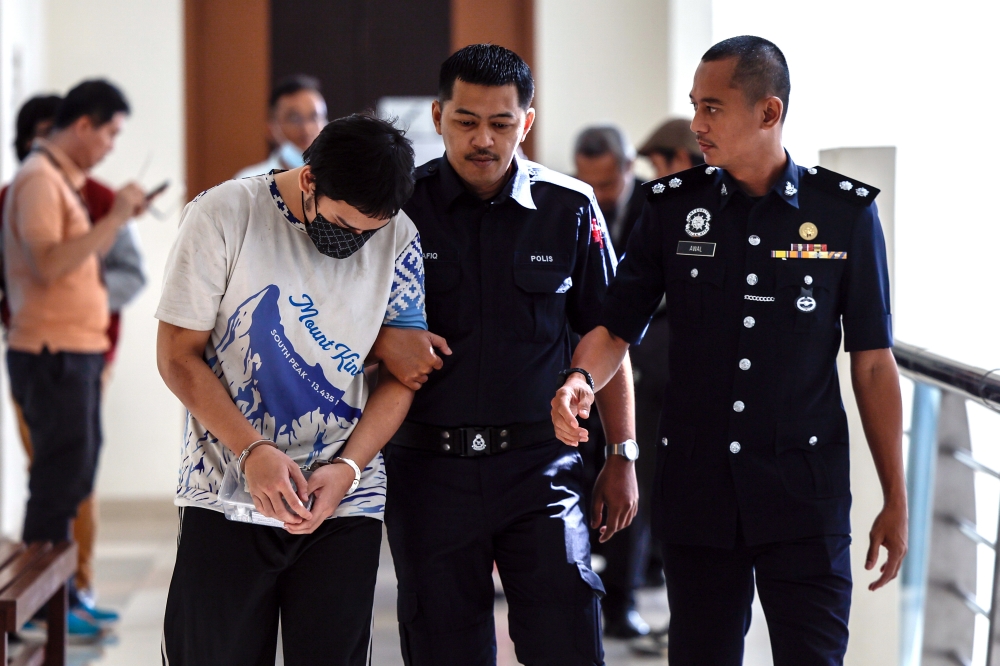 Man pleads not guilty to robbing security guard of shotgun outside Klang bank