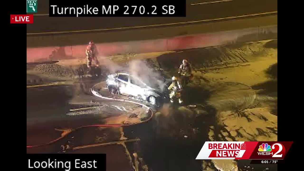 Video: Firefighters work to extinguish vehicle fire on Florida's Turnpike in Orange County