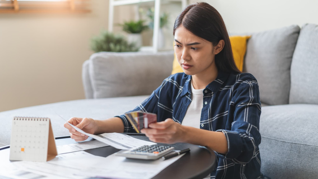 Experts say putting every dollar toward $35,000 in credit card debt could backfire — here's another approach