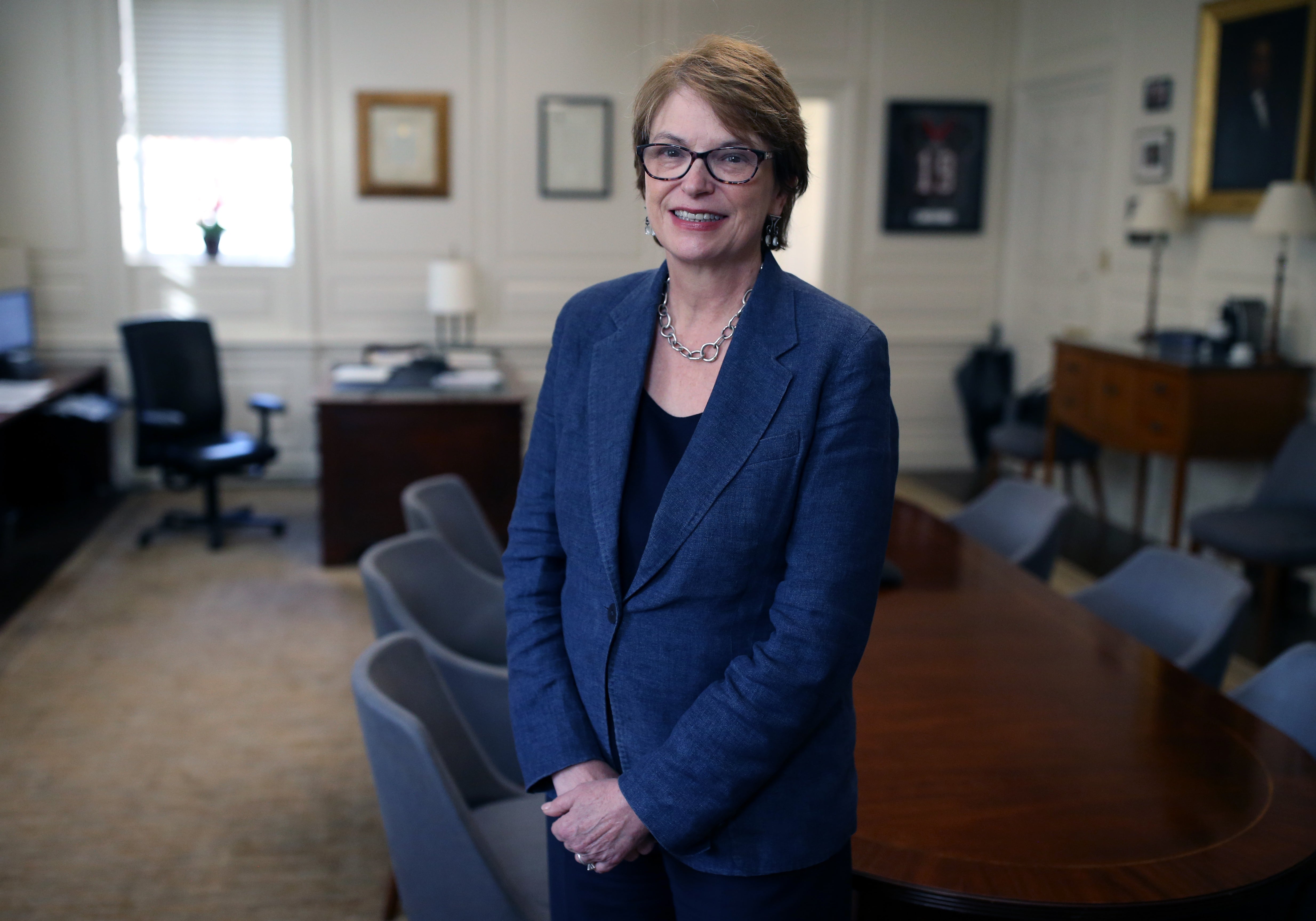 Brown’s president will resign after a tenure that included Trump deal