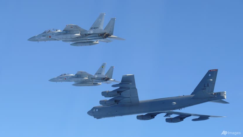 Japan casts military buildup as path to economic prosperity