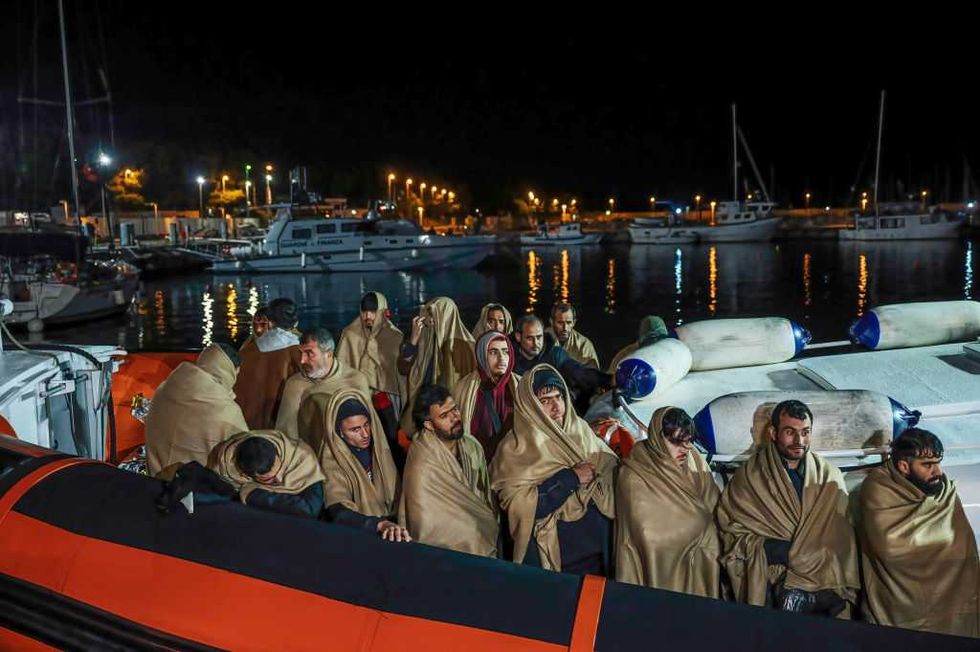 Corpse of Scottish woman who helped asylum-seekers stuffed into suitcase by migrant, say police