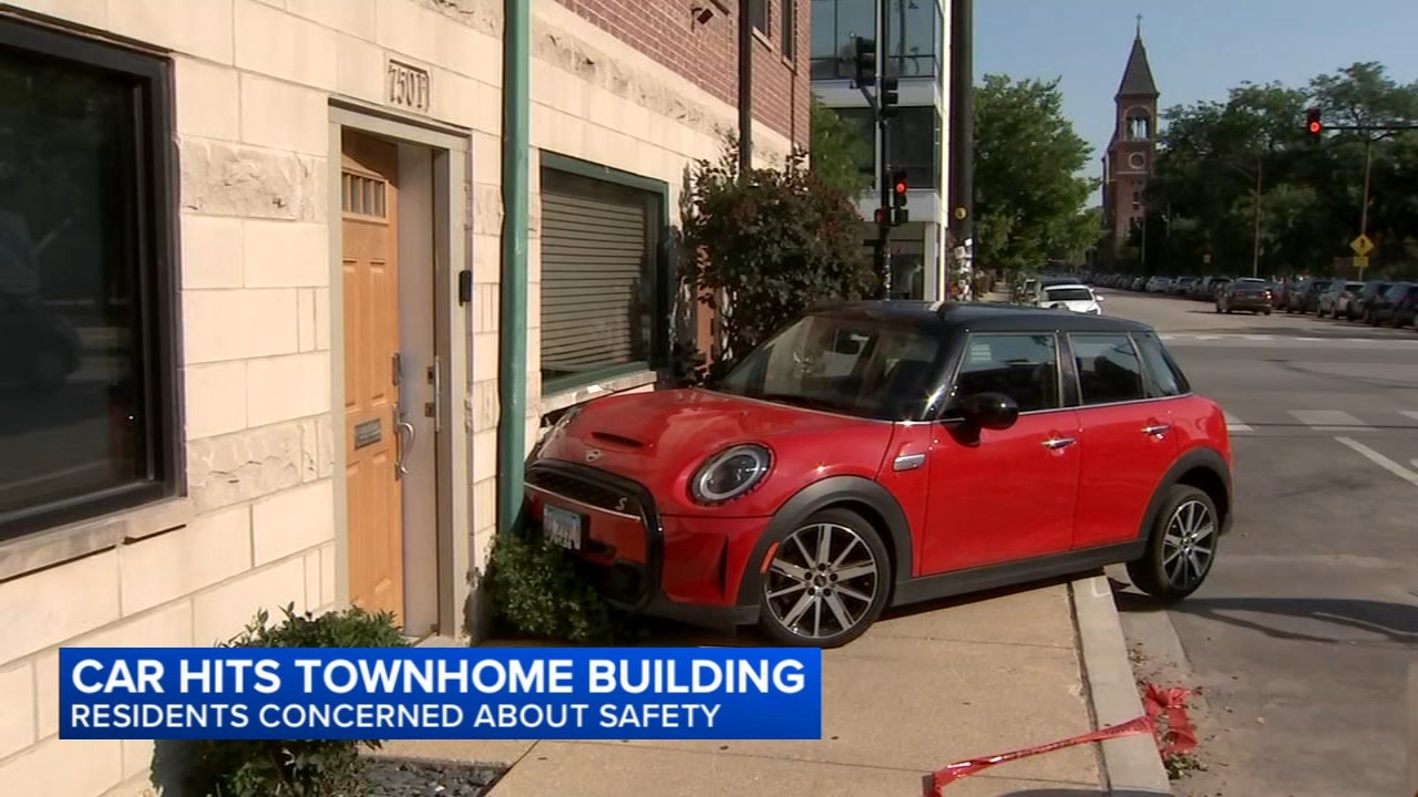 Vehicle finally removed from West Town townhome after crash: homeowners