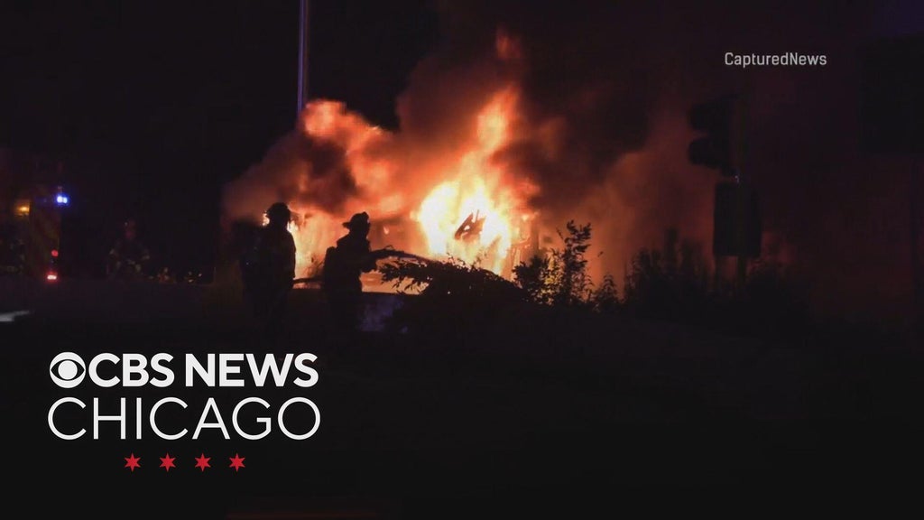 Car fire rages on Edens Expressway ramp at Touhy Avenue
