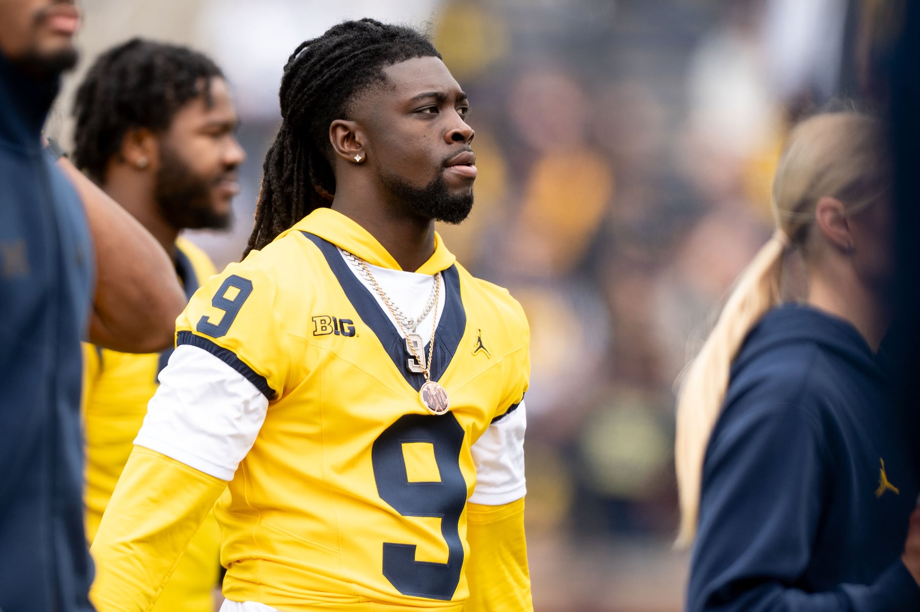 Michigan plays it cautious early with returning Rod Moore, John Henry Daley
