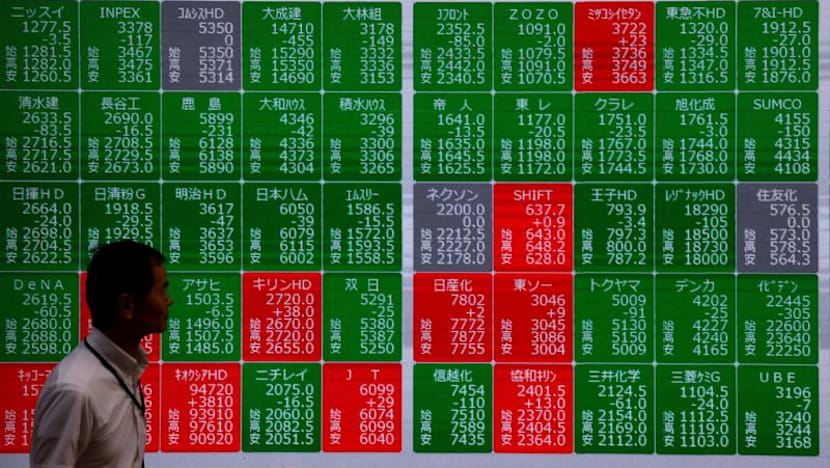 Asian stocks mostly down with tech firms back under pressure