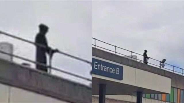 Man charged after standing atop Welsh hospital in costume resembling Grim Reaper