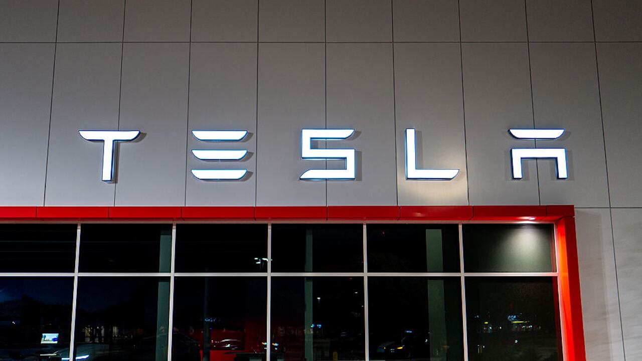 Motorist crashes Tesla through brick wall, damages 4 homes