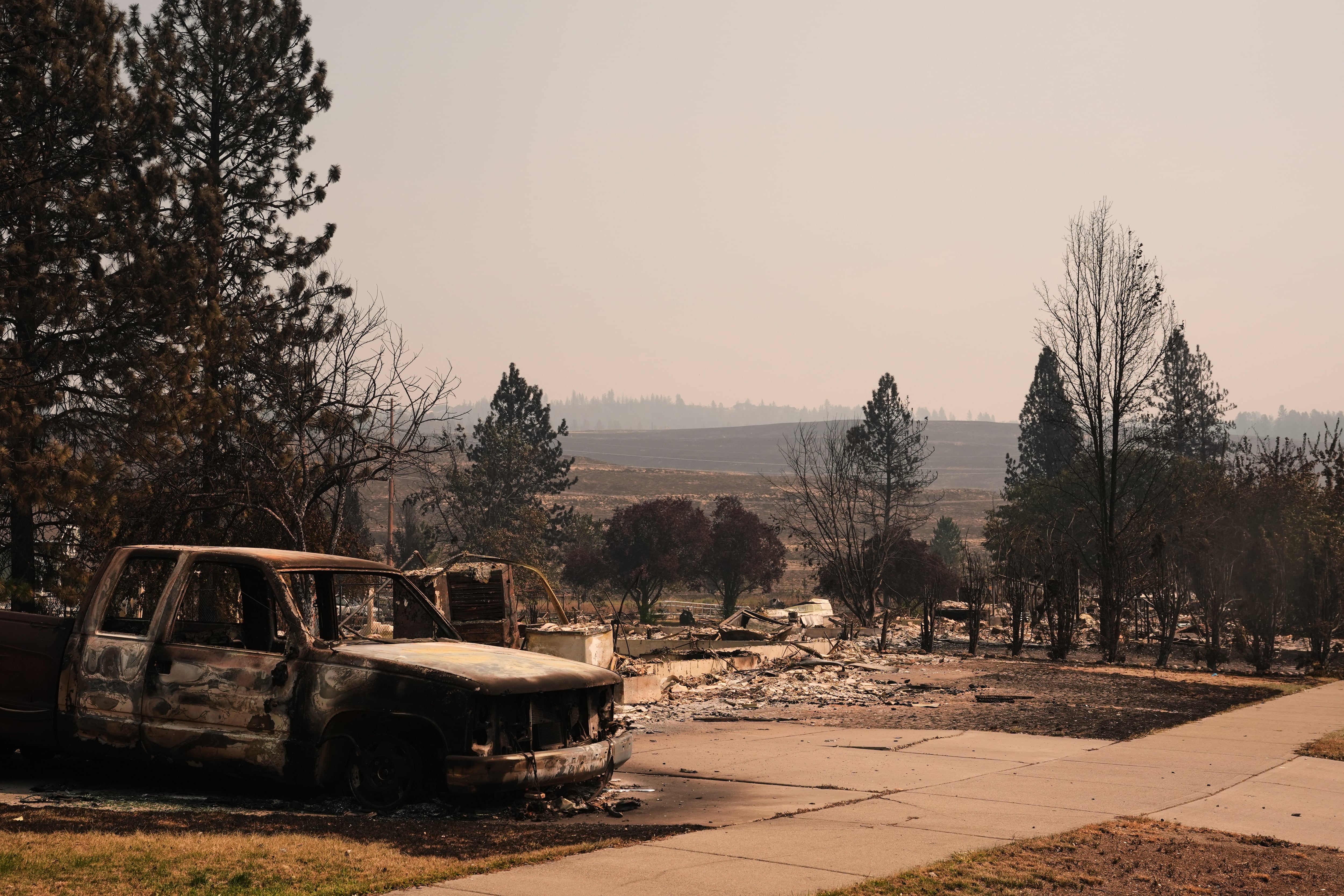 Firefighters get a handle on Spokane wildfires as tens of thousands remain evacuated