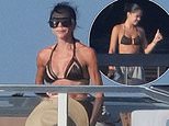 Victoria Beckham, 52, and Kim Turnbull, 25, wear matching tiny black bikinis as shirtless David, 51, tops up his tan on luxury yacht in St Tropez after estranged son Brooklyn's latest social media jibe
