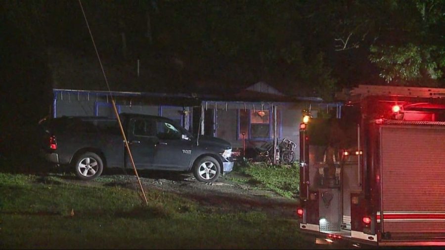 Boy rescued from Ohio house fire was locked in dog cage; father denies wrongdoing