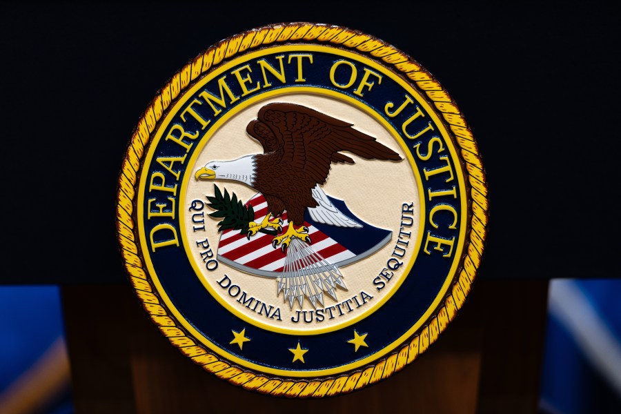 Florida federal prosecutor who was fired over posts critical of Trump sues Justice Department