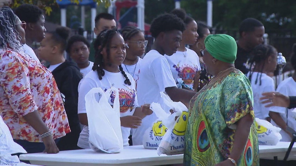 Hazel Crest students pass out hot meals as community continues recovery from July tornado