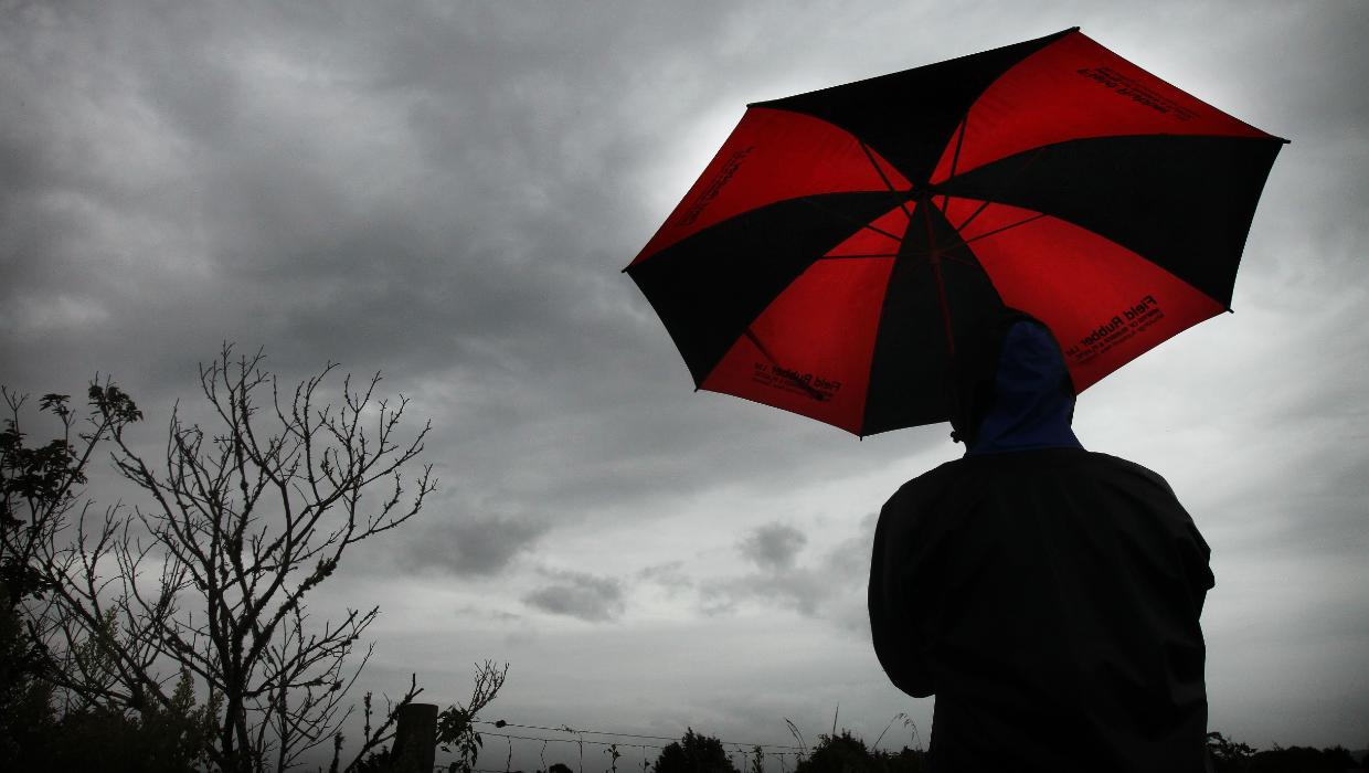‘Wet and miserable’ Sunday with one heavy rain warning, but warmer weather on the way
