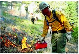 Crews battle fires in the Northwest as winds, heat persist