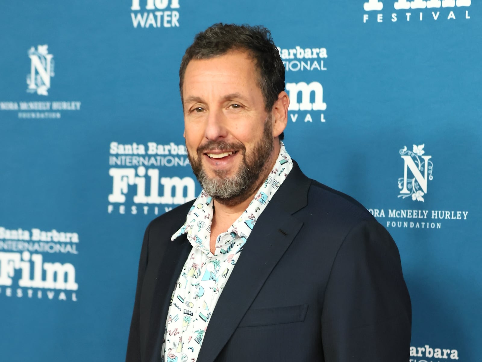 Adam Sandler’s daughter reveals why he wears socks in the pool