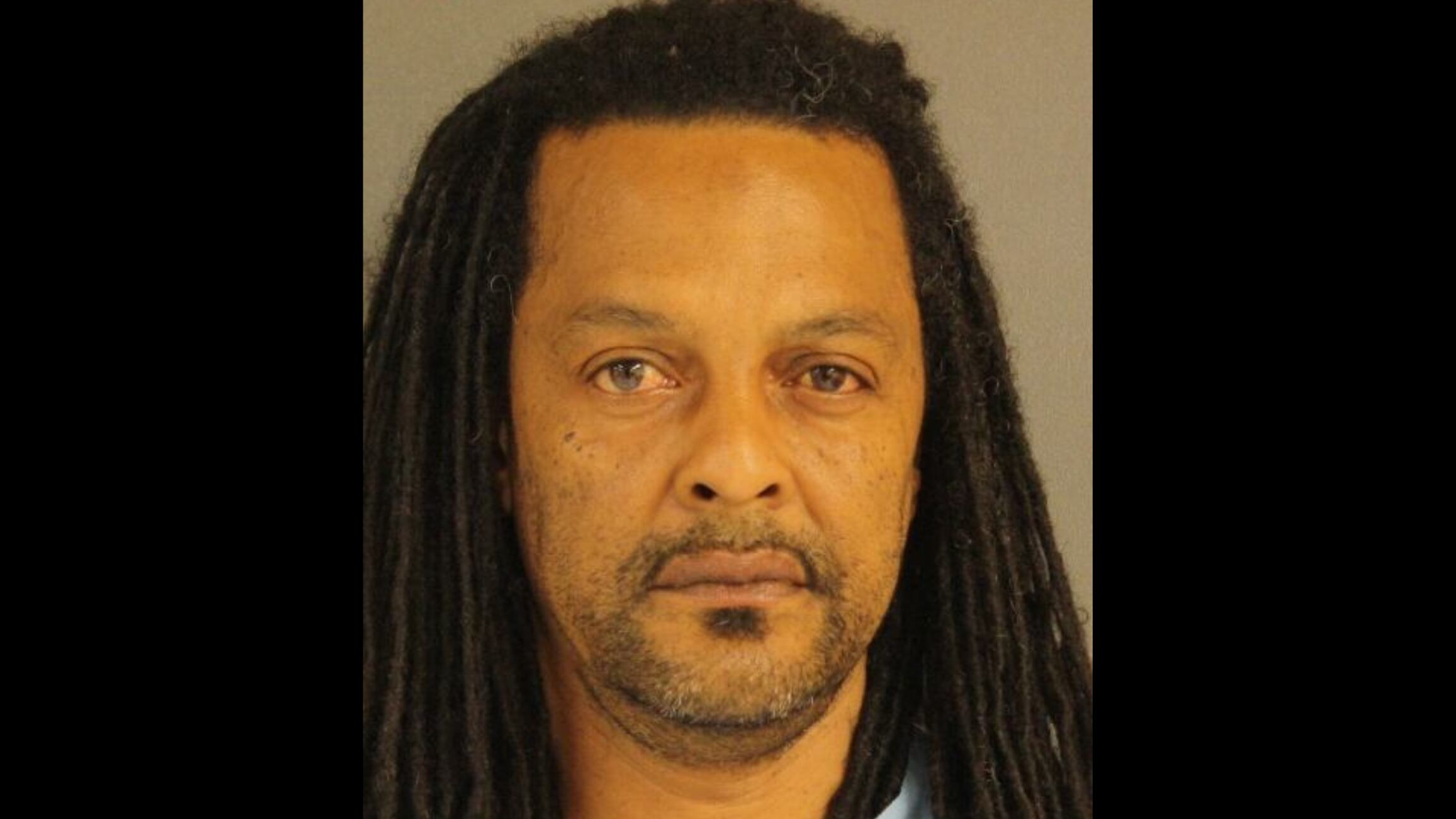 Alleged person of interest in death investigation of woman found hanging from tree arrested on unrelated charge