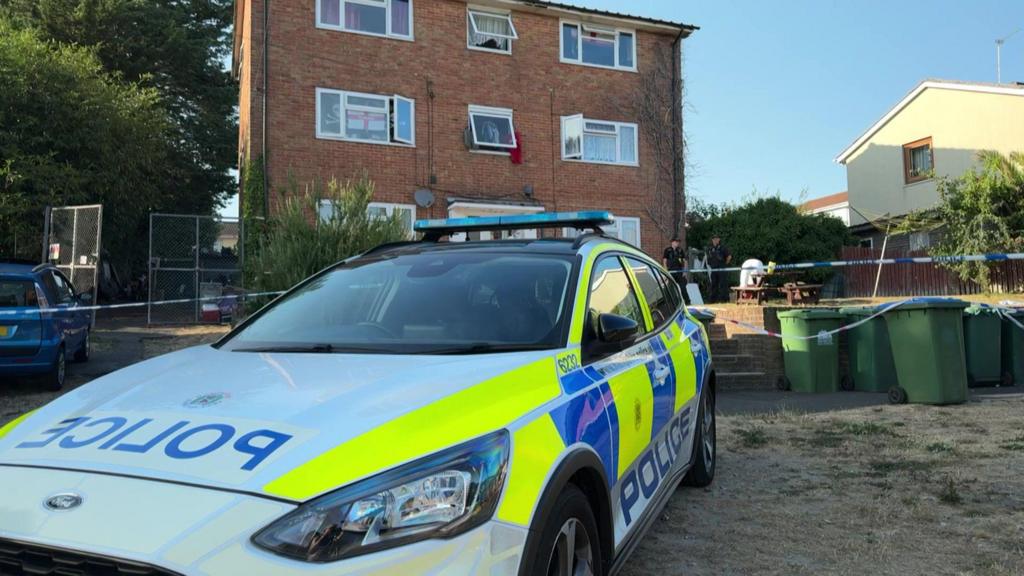 Two arrested after man found dead in early hours