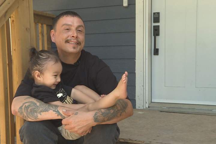 ‘It’s for the kids, and his kids’: Affordable homes from $1 lots in Winnipeg