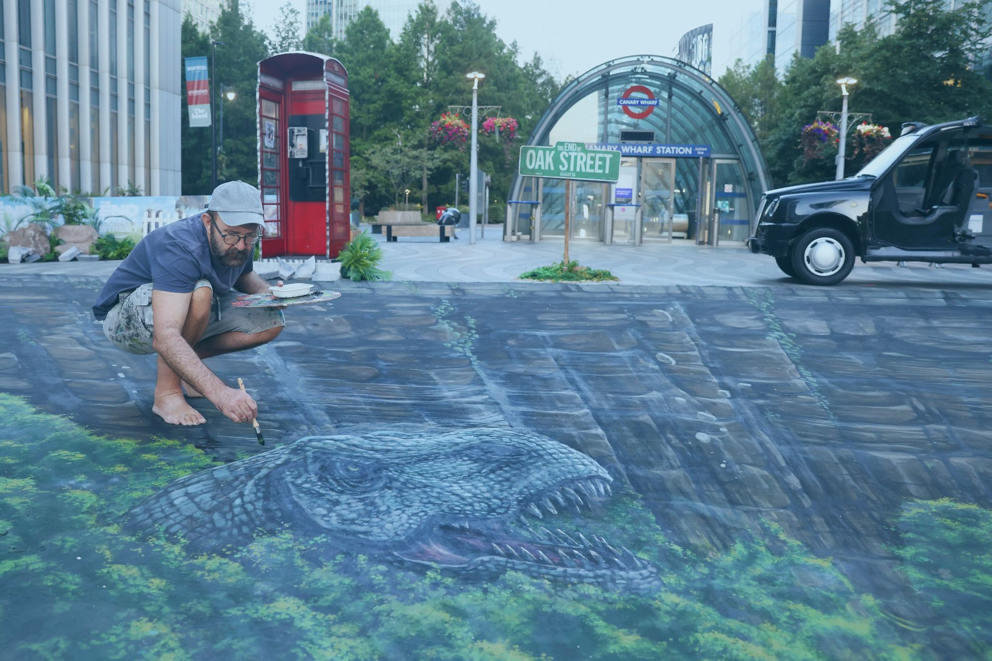 Dinosaurs descend on Canary Wharf as square crumbles into prehistoric past