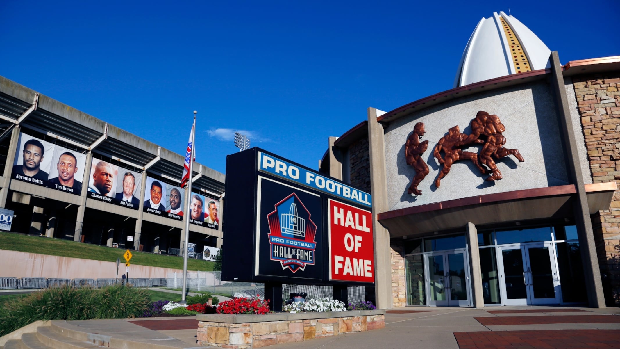 The troubled football project beside the Pro Football Hall of Fame is trying again