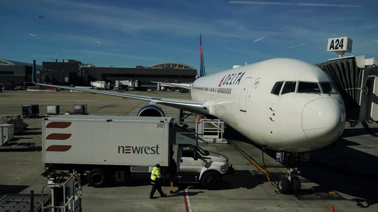 Delta flight from New York to Atlanta met by law enforcement after passenger-flight attendant dispute