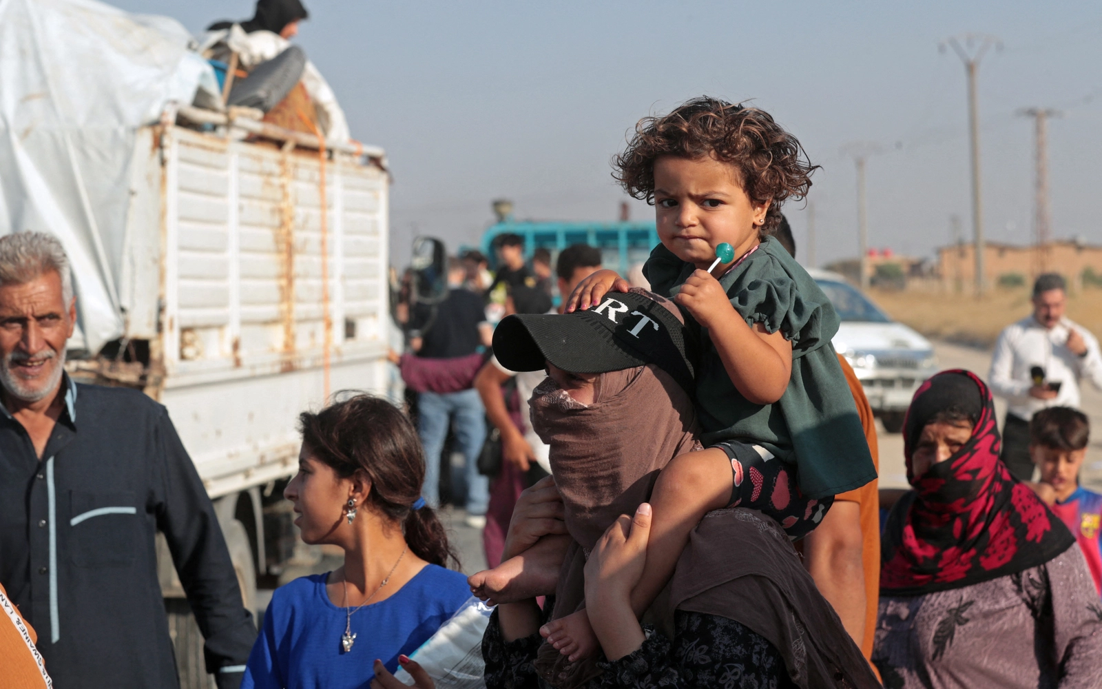 Return of displaced Syrian Kurds to hometown suspended after violence