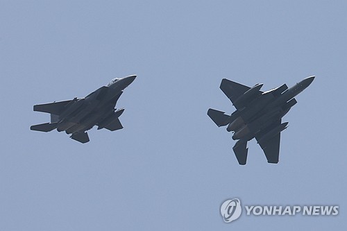 2 ex-Chinese military officers arrested over alleged eavesdropping, leaks