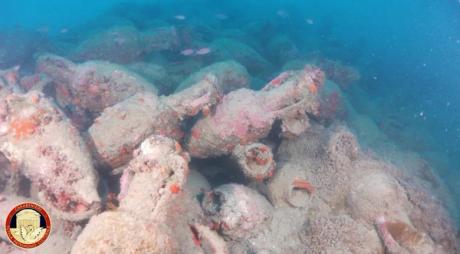 Bottoms up: vast Roman shipwreck filled with ancient wine amphoras discovered near Sicily