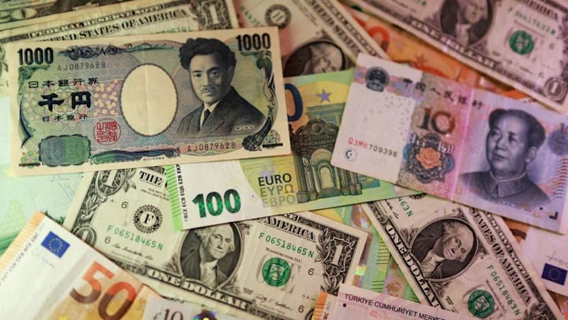 Dollar steady as traders await key US inflation data
