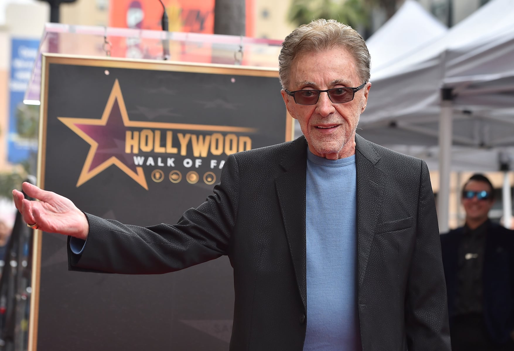 Music legend, 92, seen being helped out of car after cancelling tour for health reasons
