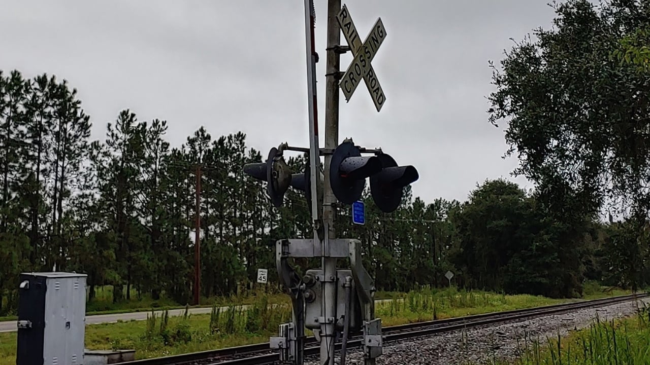 ‘I saw my guardian angel’: Man lifts railroad crossing arm to save woman trapped on tracks