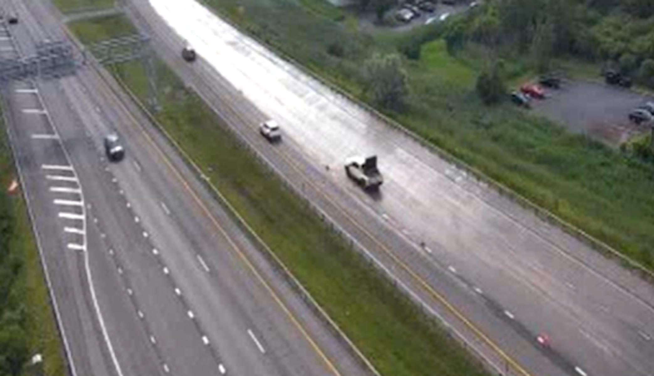 Dump truck spills load of gravel on Interstate 690 East in DeWitt