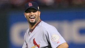 Fans clamored and Cardinals listened: Navy caps are going back on the road full-time