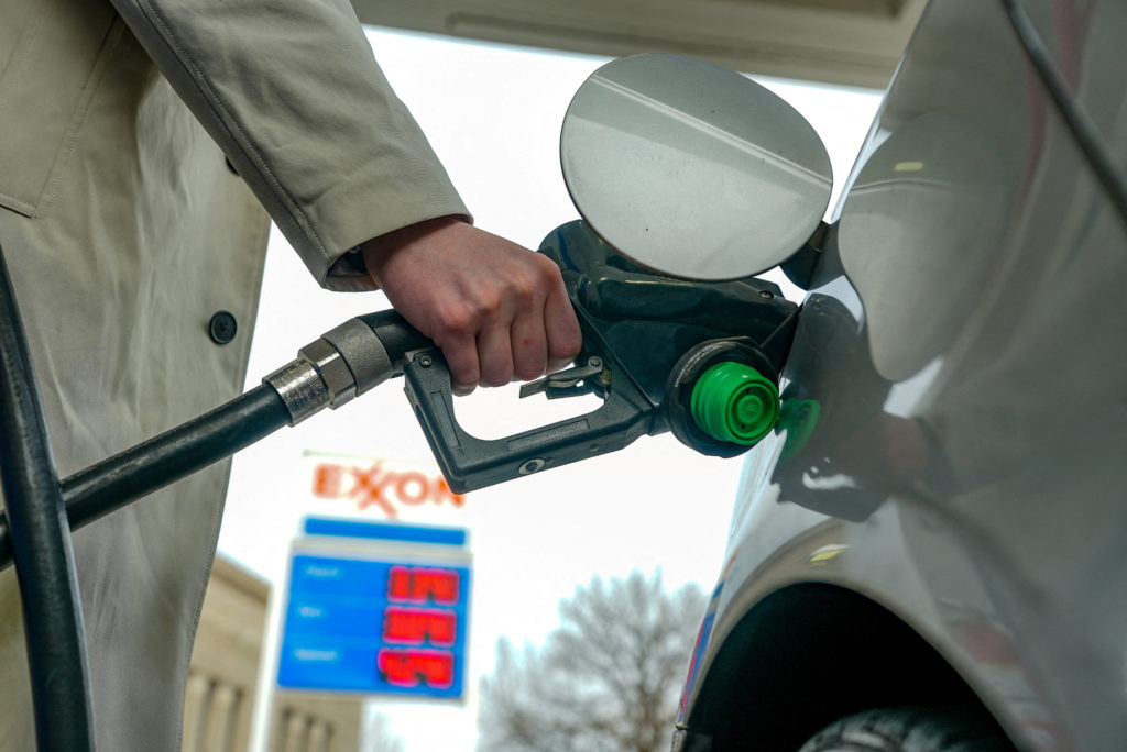 U.S. stocks edge further from their records as oil prices keep swinging