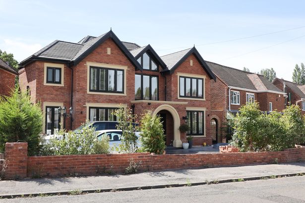 Homeowner faces bulldozing £400k dream home - because it's 50cm too wide