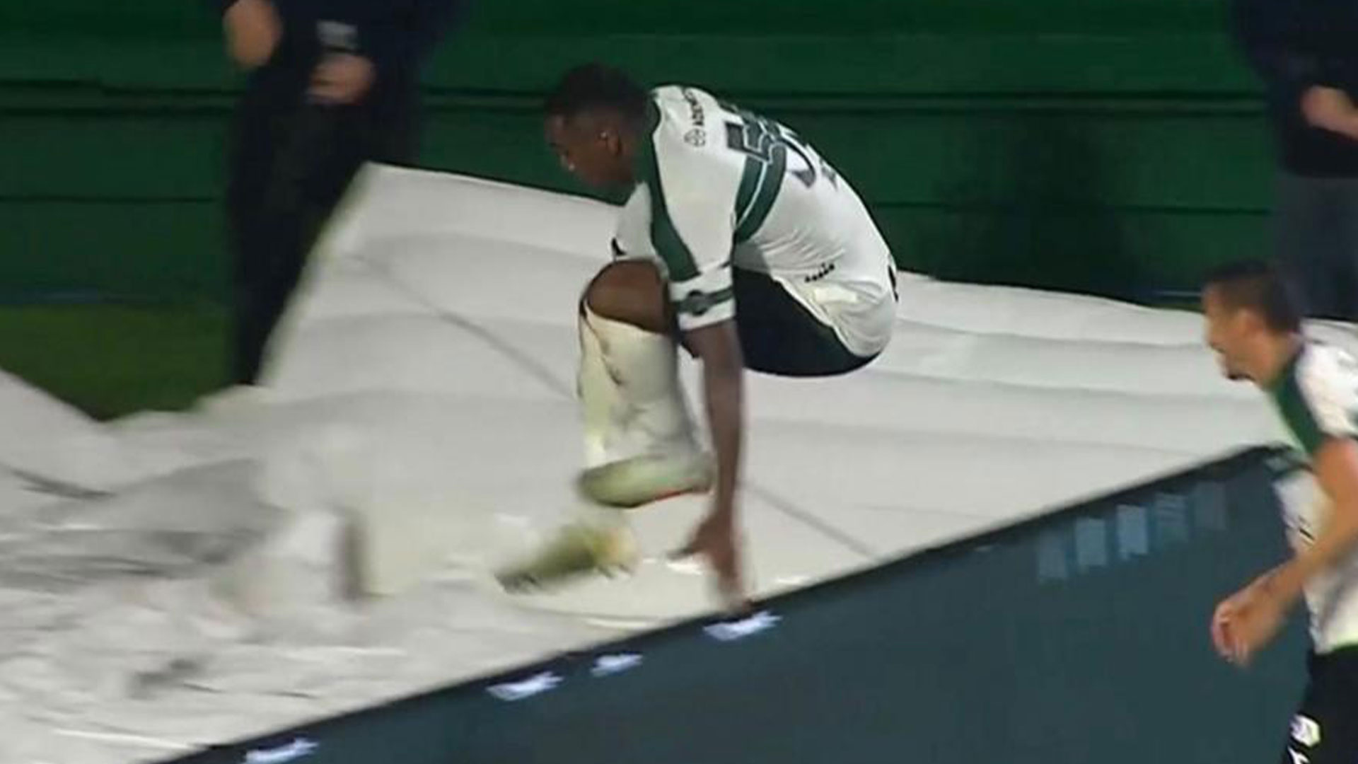 Viral footballer who plummeted down hole while celebrating reveals romantic reason he jumped over barrier