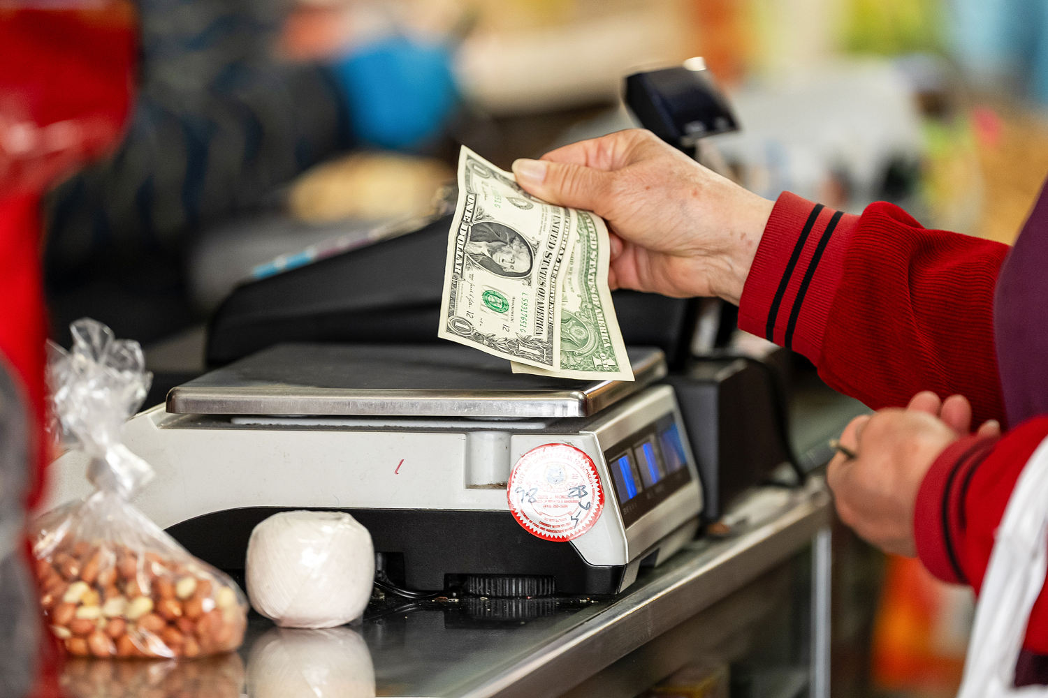 Inflation in focus as wage growth slows for workers