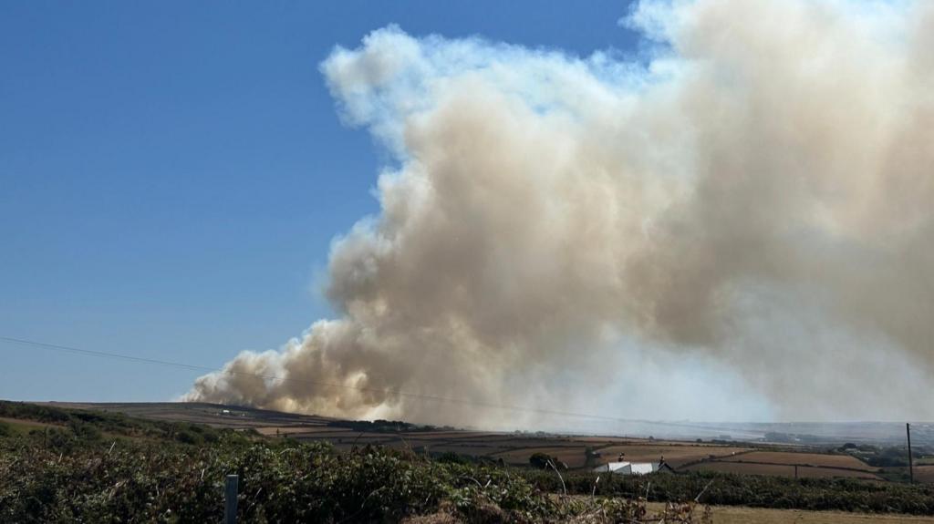 Crews tackling wildfire near Land's End Airport