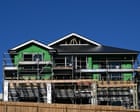 Coalition plan to scrap energy rules for new houses condemned as ‘cost-of-living timebomb’