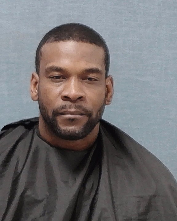 Suspect arrested after 2 women found dead inside burning Canton apartment