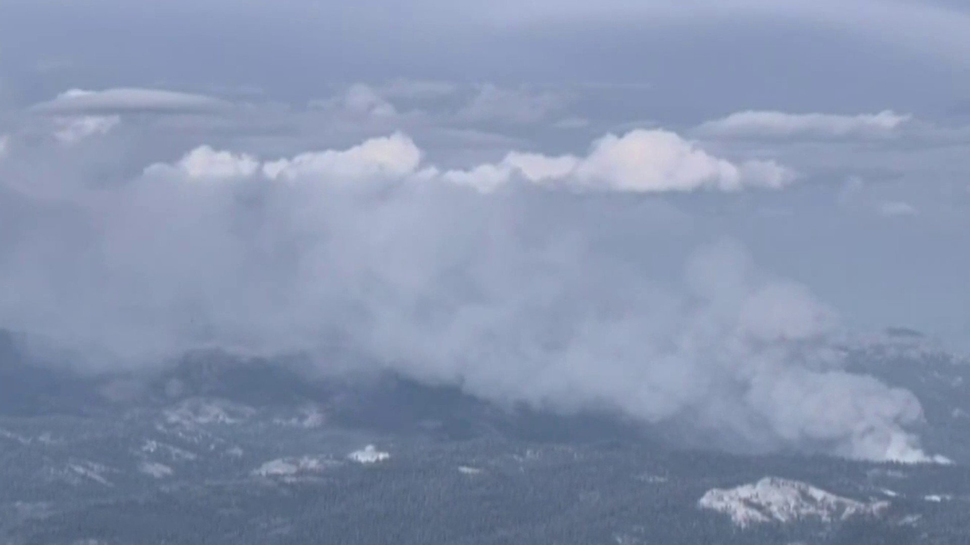 Firefighters battle wildfire west of Lake Tahoe