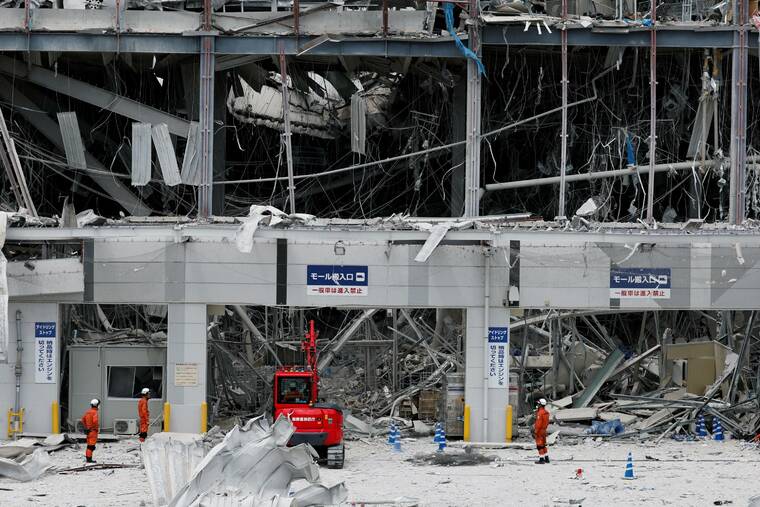 2 killed in blast were told to return to mall