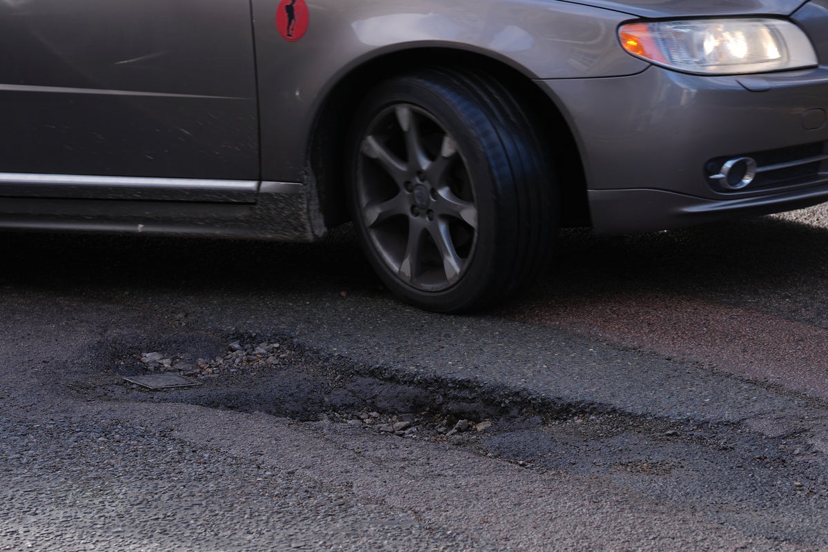 Extreme heat making UK roads sticky and worsening potholes, motoring chief warns