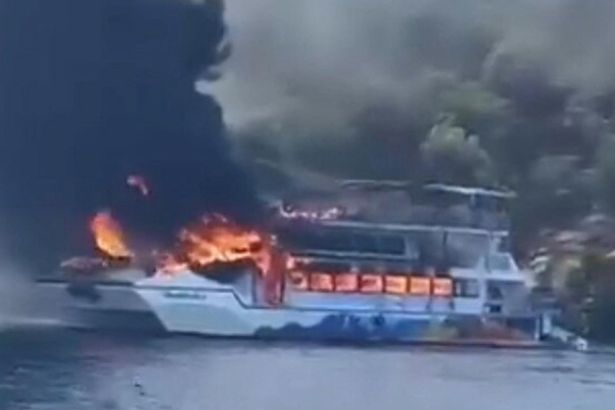 Turkey trip boat carrying 115 bursts into flames as families leap into the sea