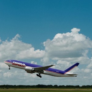 FedEx 777 in retro livery lands at Memphis airport renamed for Fred Smith