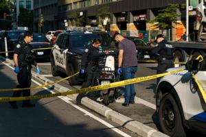 Man arrested, another sought after Toronto police officer shot in the leg during stolen e-bike call